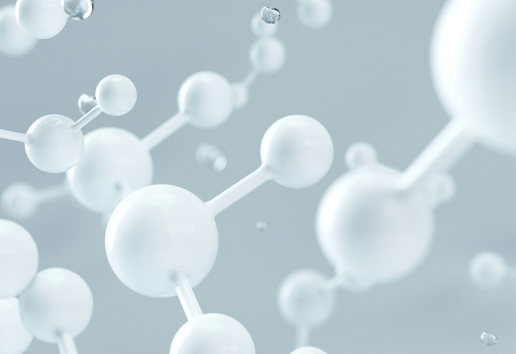 Anvisualisierte Wasserstoffmoleküle in weiß vor einem grauem Hintergrund