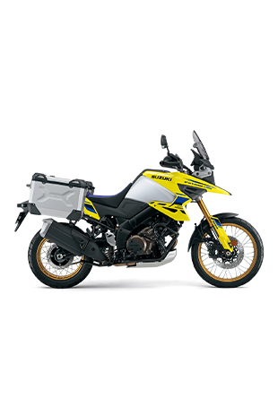 Suzuki V-Strom 1050DE Travel Edition in Gelb (CD8), ausgestattet mit robusten Seitenkoffern, ideal für lange Abenteuerreisen. Offizielles Modellbild mit Logo und 'Travel Edition'-Schriftzug.